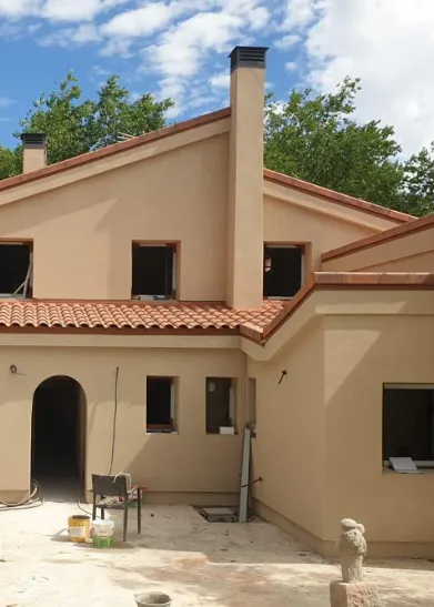 Casa con tejas mixtas Casa con tejas mixtas